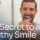 man brushing teeth in the mirror